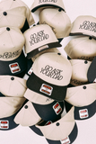 Collection of 'GO ASK YOUR DAD' caps with OTTO branding on a white background