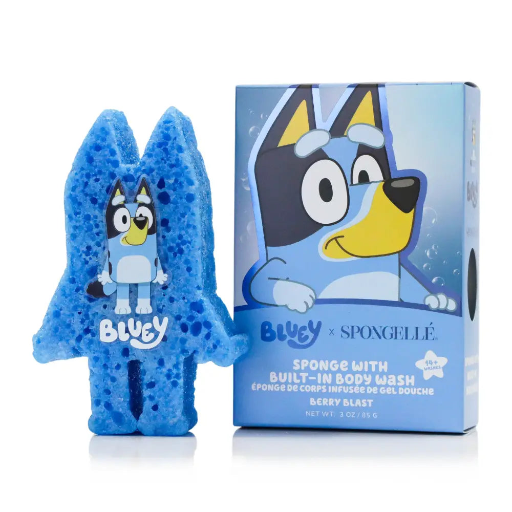 Bluey x Spongelé body wash sponge and its retail box on a white background. The sponge is bright blue with a built-in character figure of Bluey, and the box features Bluey's illustration with the text 'Bluey x Spongelé' and 'Berry Blast'.