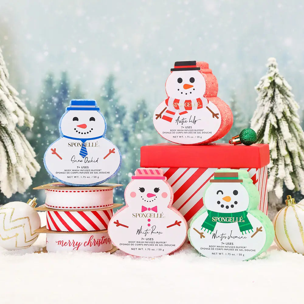 SpongeLefe bath bombs with Christmas-themed designs and snowman figures on a snowy background.