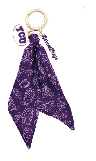 Purple bandana keychain with gold ring and 'TCU' branding on a white background