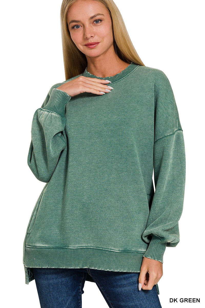 Green sweater on a white background