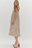 Woman wearing a striped dress on a white background