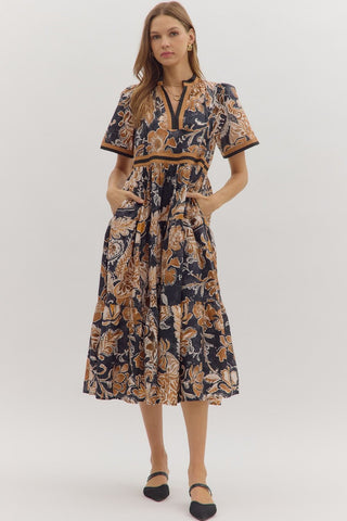 Woman wearing a floral dress on a white background