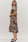 Woman wearing a floral dress on a white background